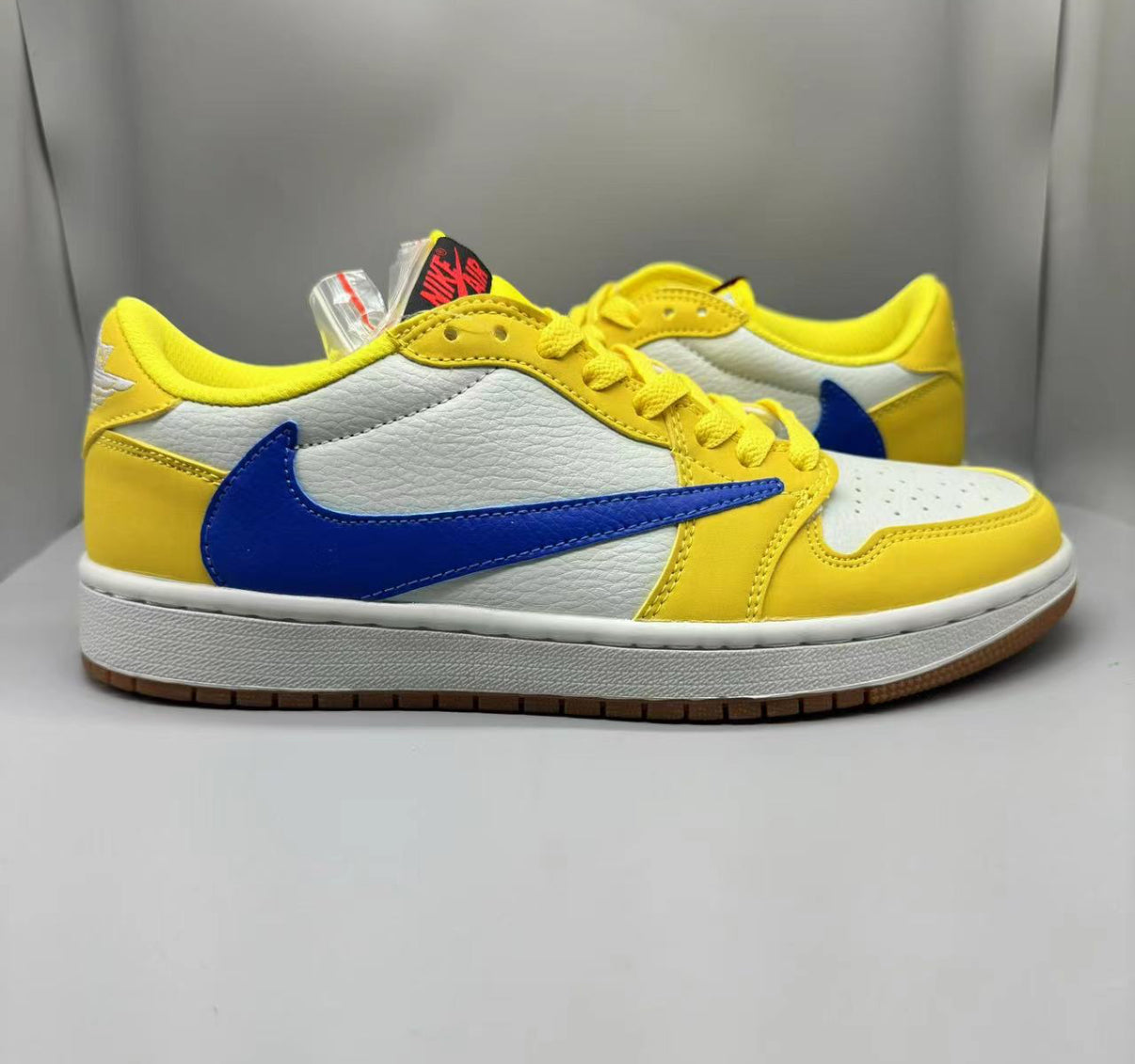 JORDAN 1 LOW Travis Jaune Blue